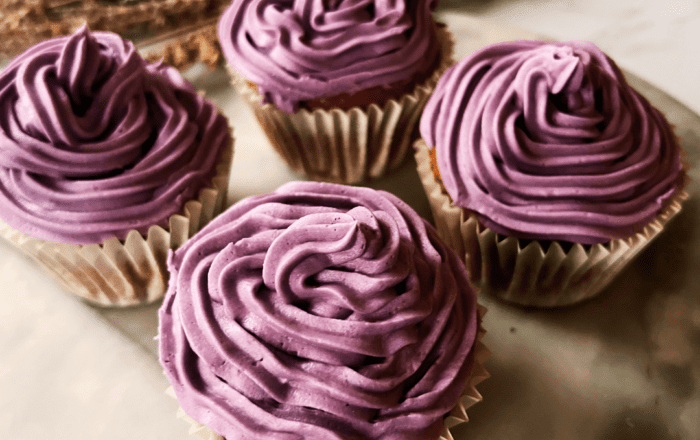 Cupcakes iced with purple lavender icing