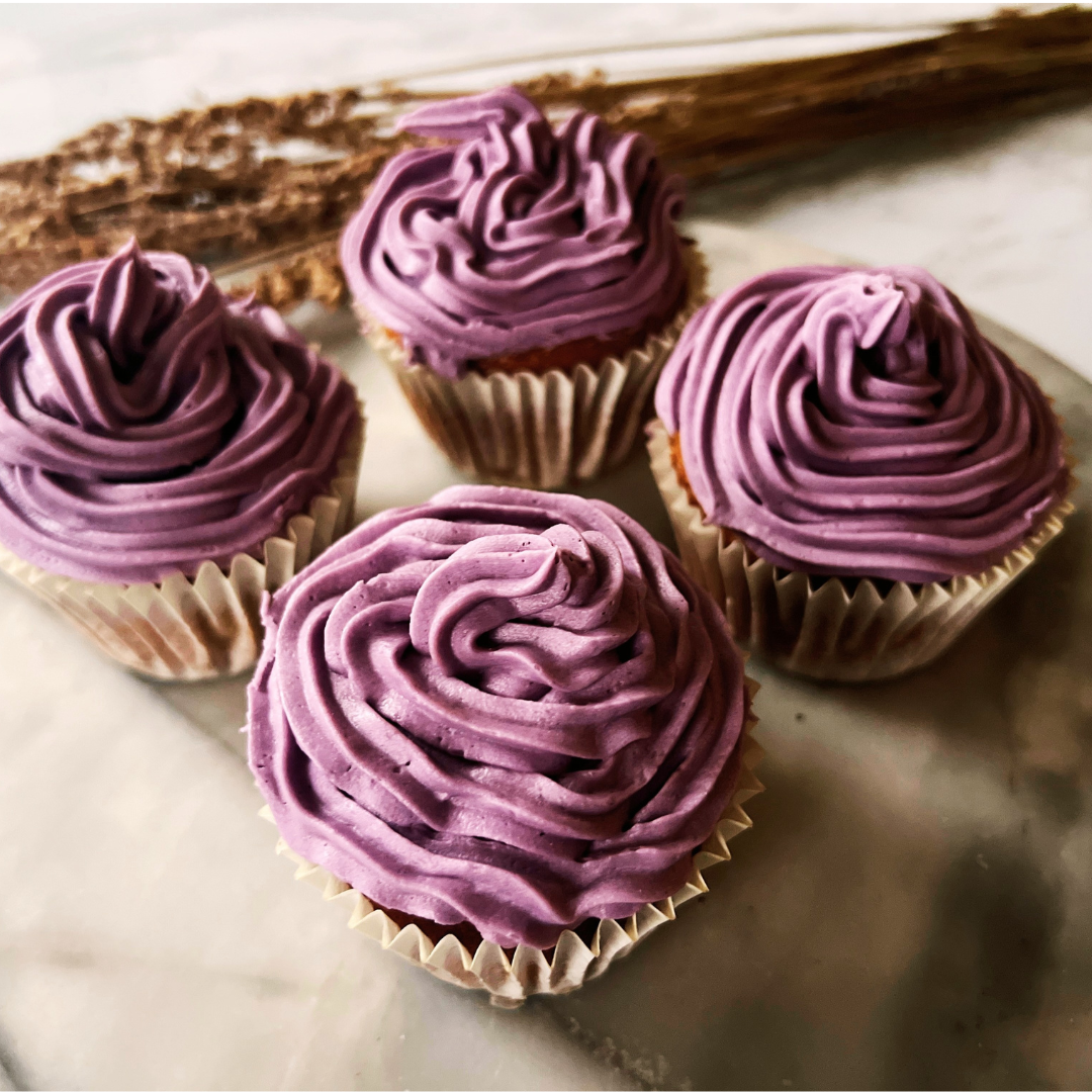 Cupcakes iced with purple lavender icing